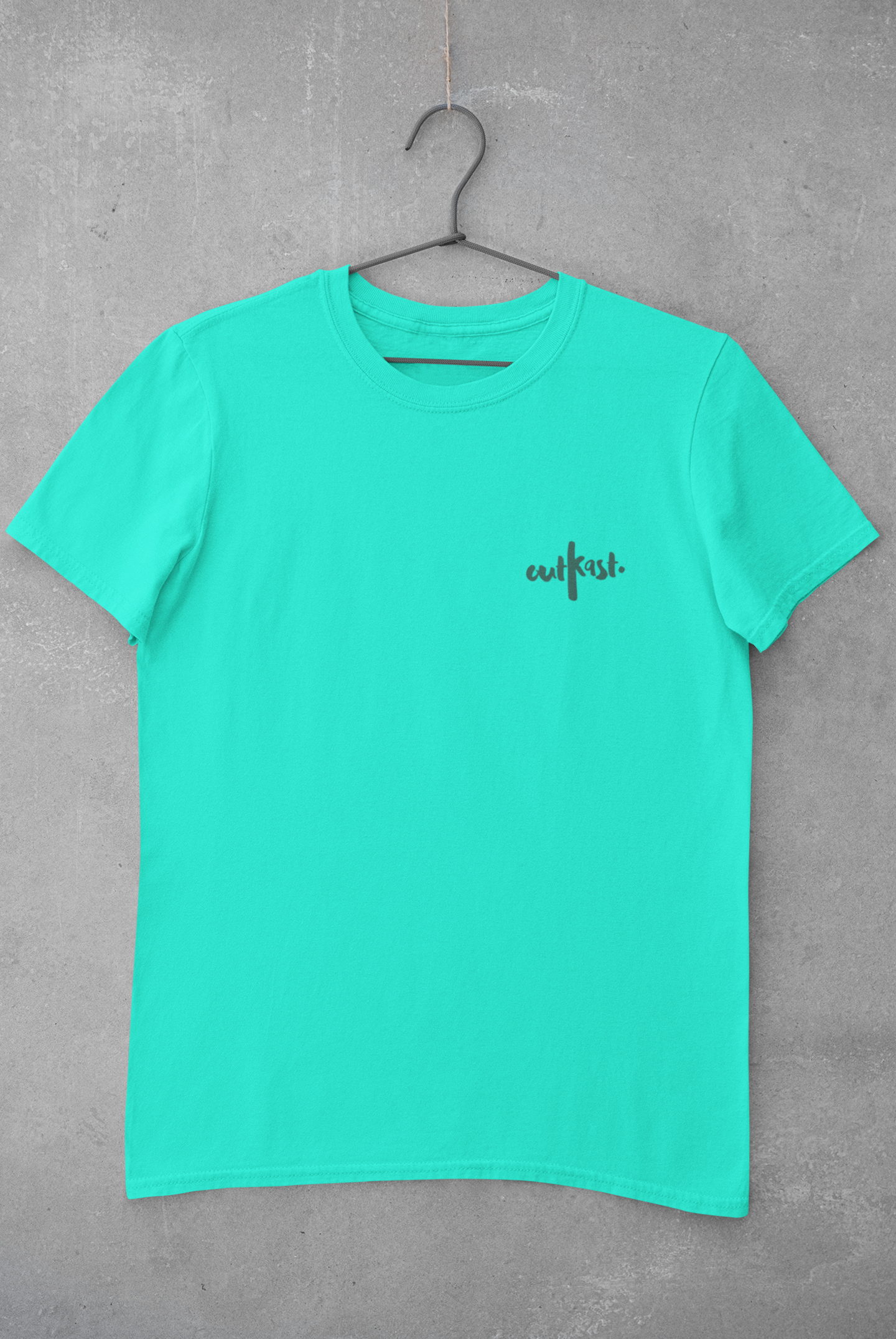 Aqua blue Outkast t-shirt with minimalist chest logo, casual unisex streetwear style on hanger.